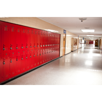 Photograph of an empty high school hallway with a row of red lockers